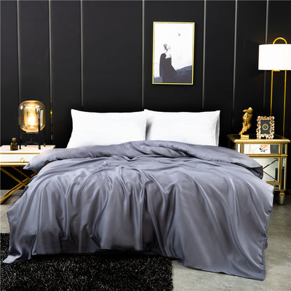 chambre avec housse de couette gris