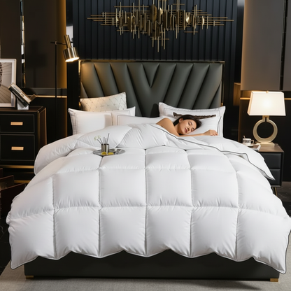 femme qui dort  avec une couette blanche