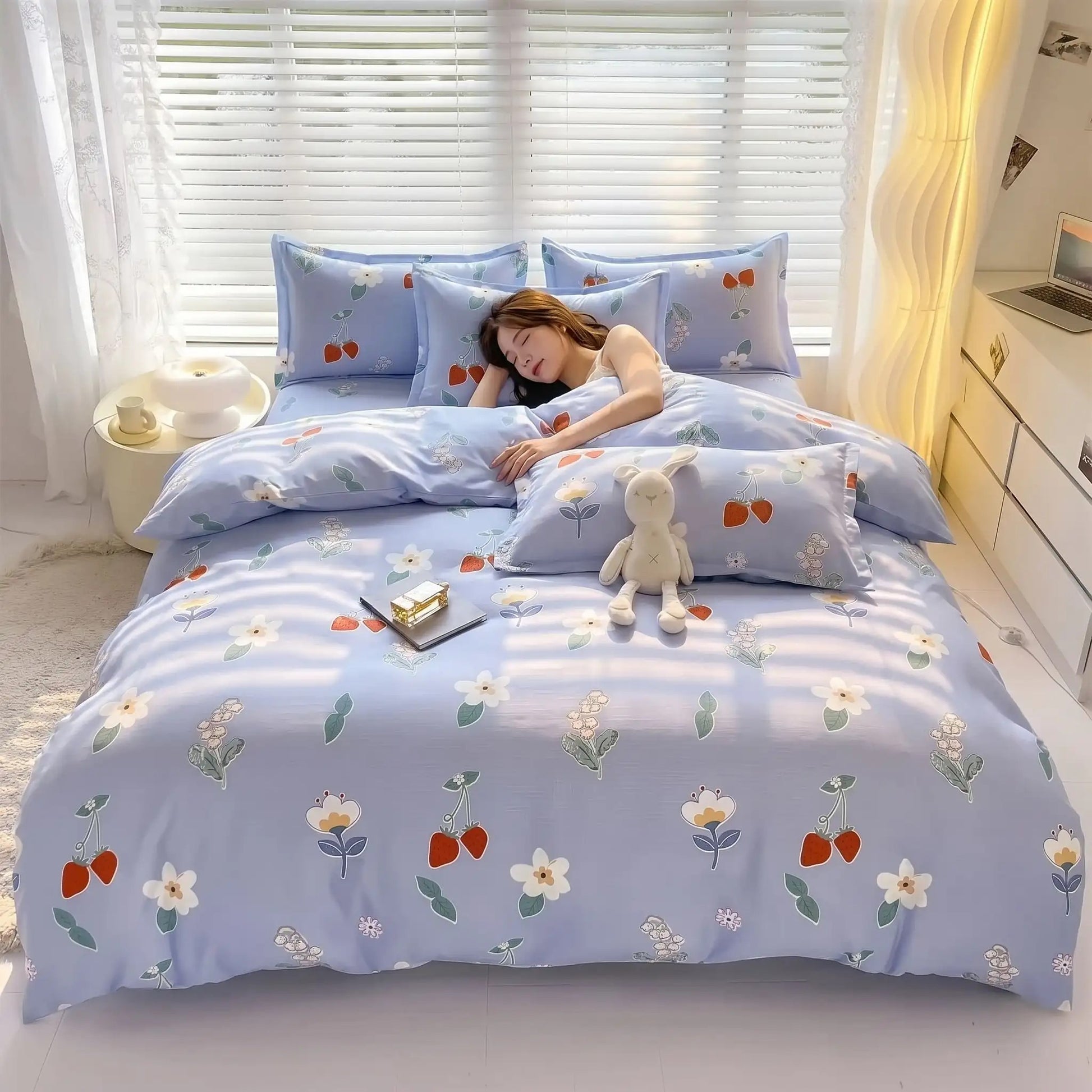 jeune fille qui dort dans son lit avec couette 140x200